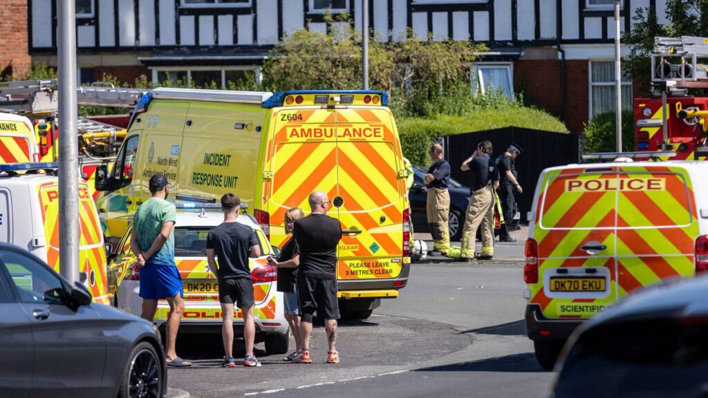 Police and emergency services arrive at the site where a man has been detained and a knife has been seized after a number of people were injured in a reported stabbing, in Southport, Merseyside, England, Monday July 29, 2024.